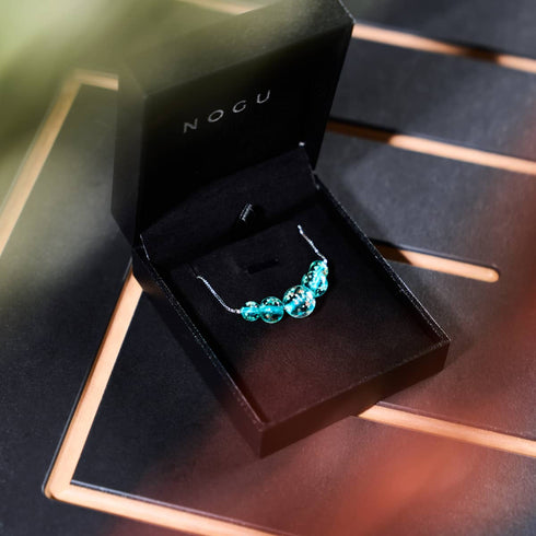 Teal | .925 Sterling Silver | Firefly Glass Infinity Clasp Necklace